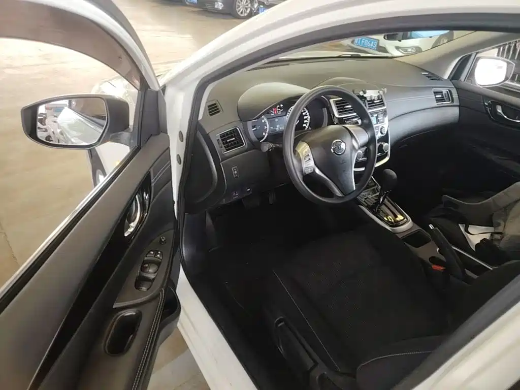 Nissan Tiida 2018 — фото 16