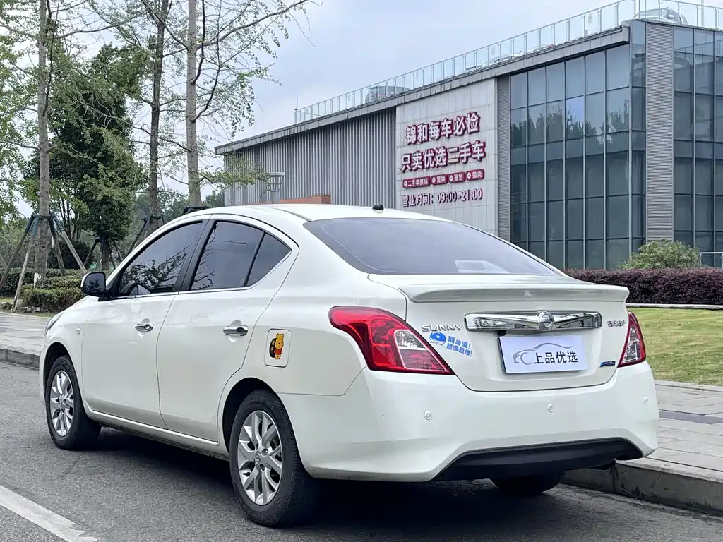 Nissan Sunny 2014 — фото 15