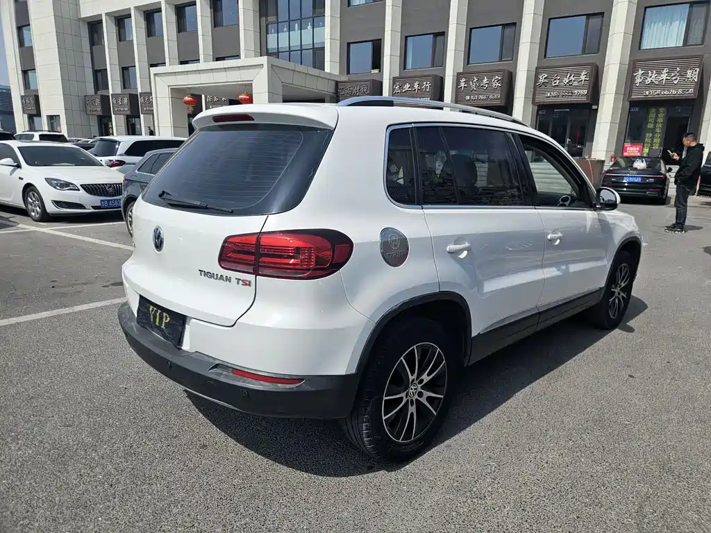 Volkswagen Tiguan 2014 — фото 2