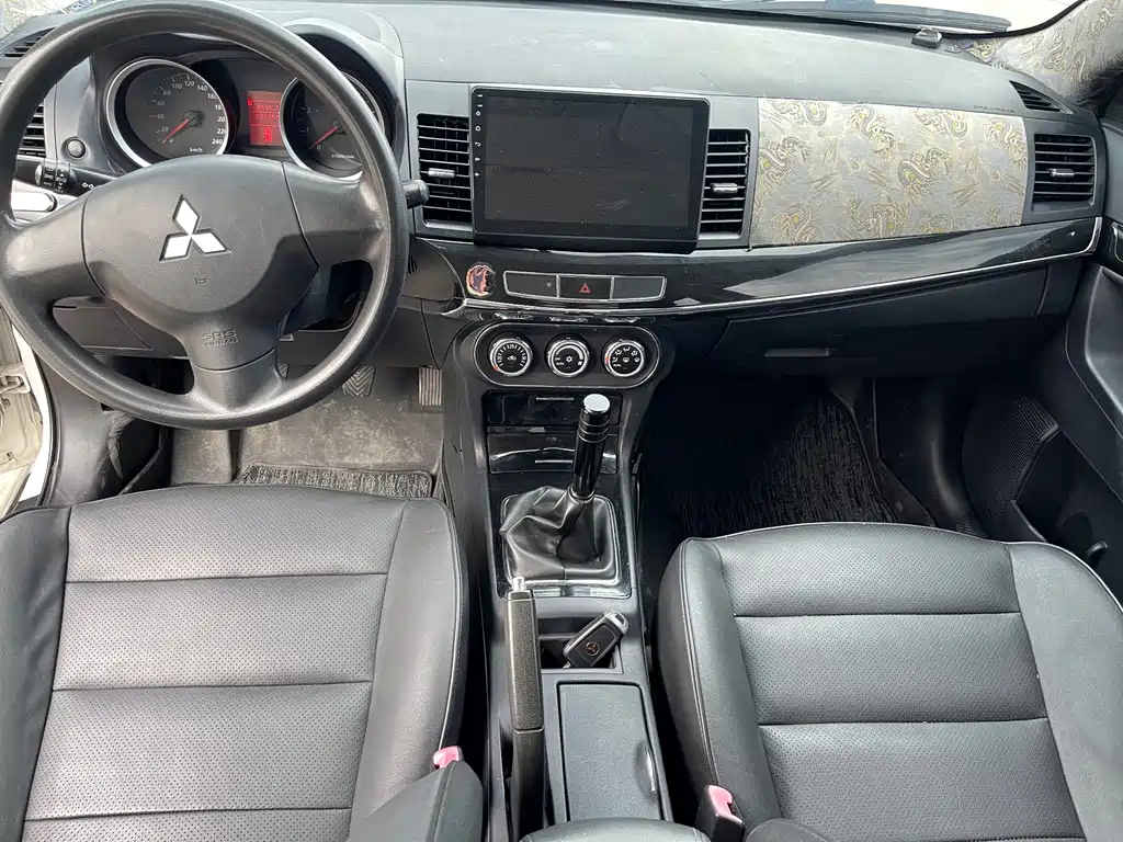 Mitsubishi Lancer EX 2014 — фото 11