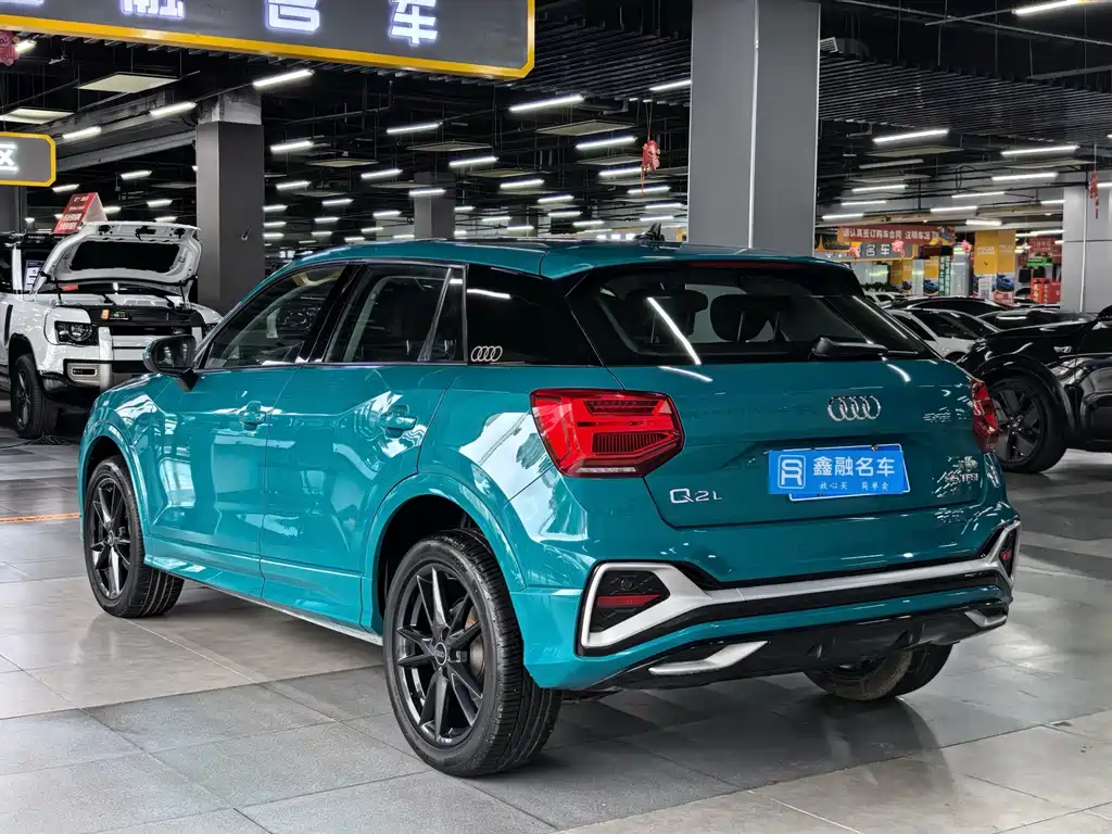 Audi Q2L 2023 — фото 20