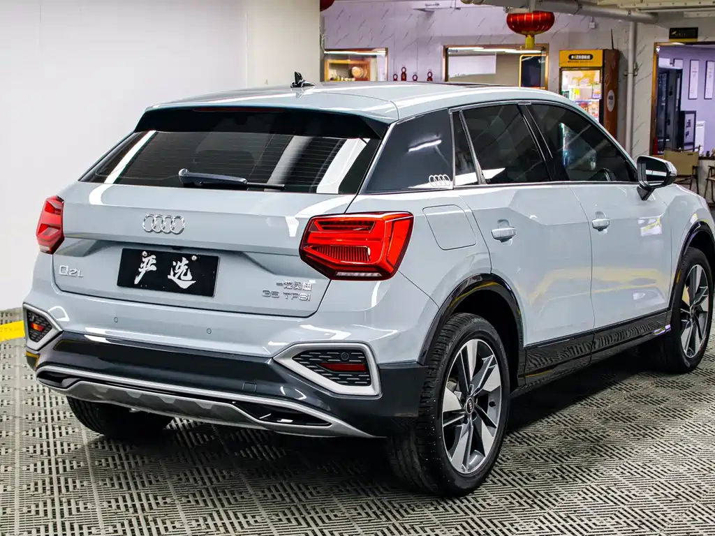 Audi Q2L 2022 — фото 22