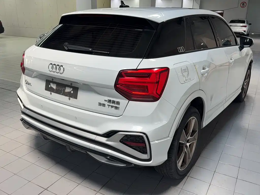Audi Q2L 2022 — фото 9
