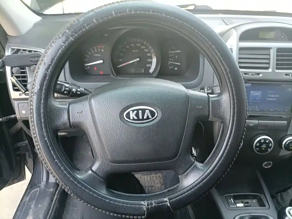 Kia Cerato 2014 — фото 11