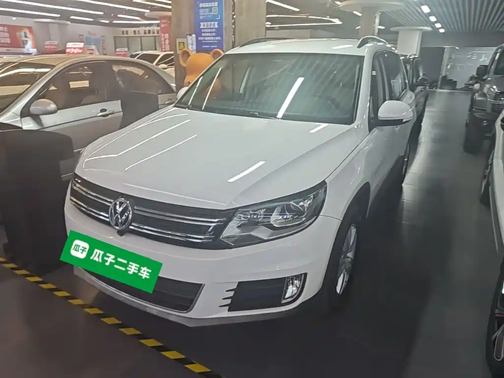 Volkswagen Tiguan 2015 — фото 1