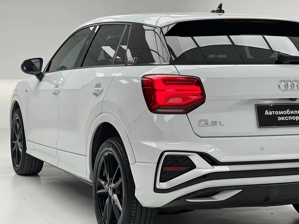 Audi Q2L 2022 — фото 8
