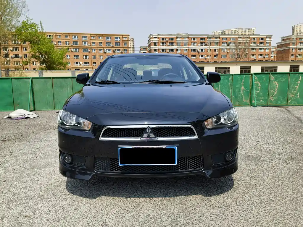 Mitsubishi Lancer EX 2010 — фото 2