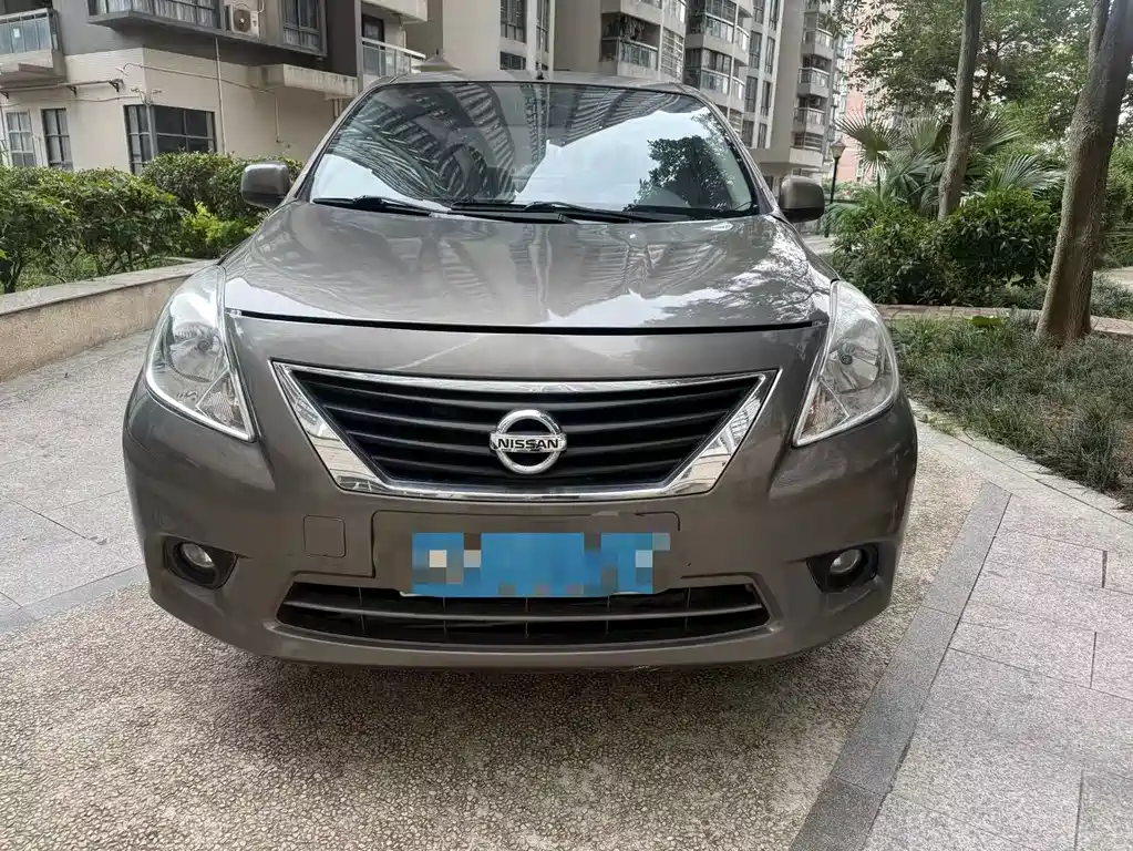 Nissan Sunny 2011 — фото 2