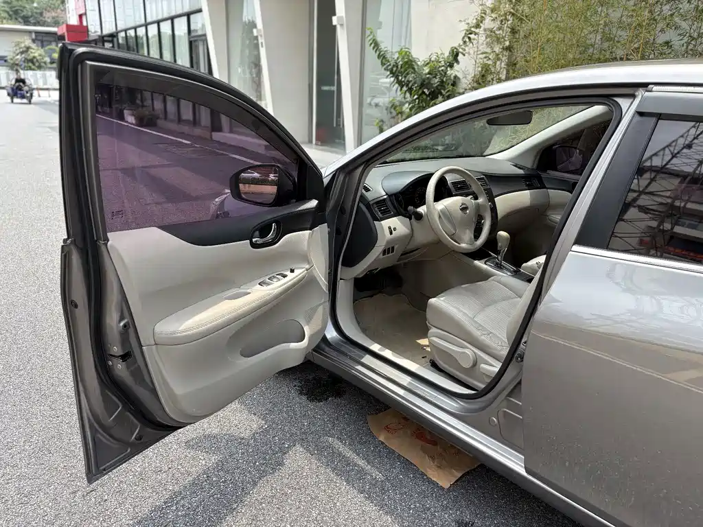 Nissan Tiida 2015 — фото 12