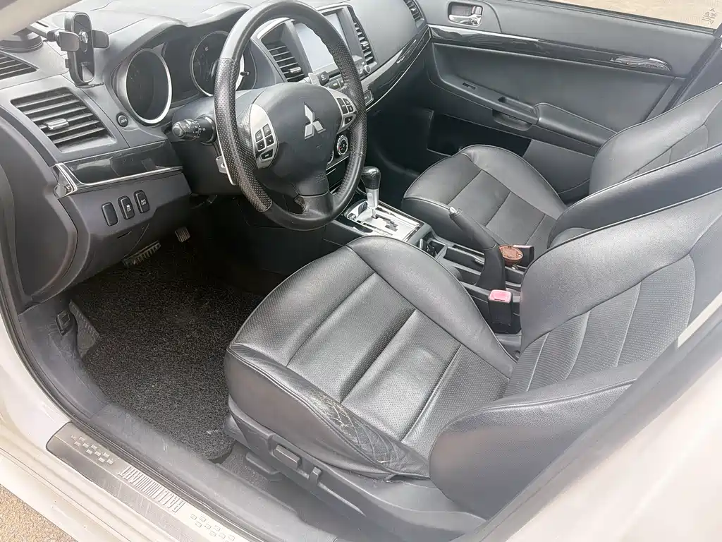 Mitsubishi Lancer EX 2014 — фото 10