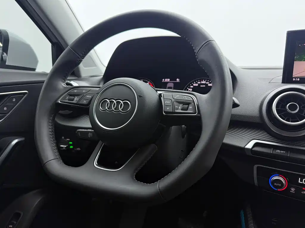 Audi Q2L 2022 — фото 13