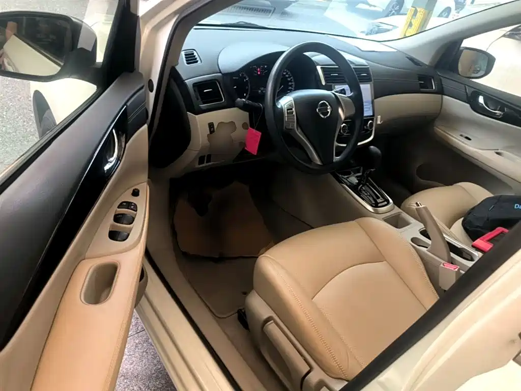 Nissan Tiida 2016 — фото 16
