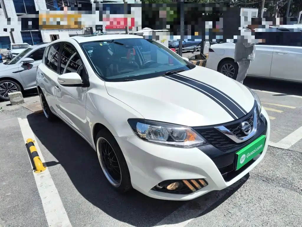Nissan Tiida 2016 — фото 22