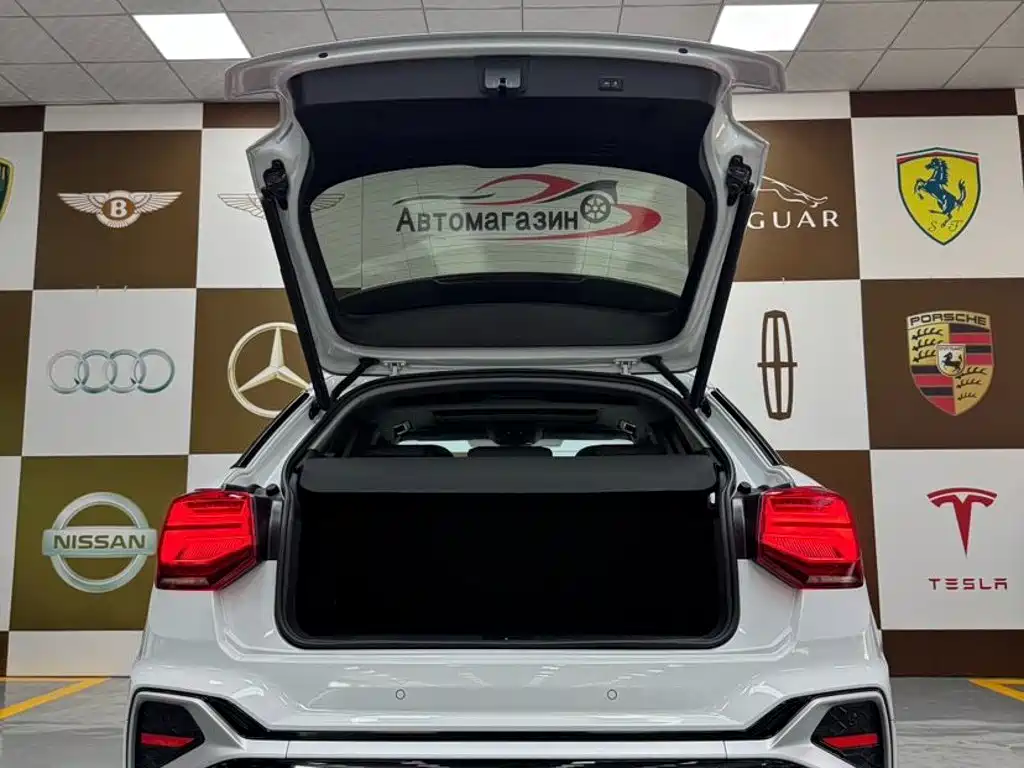 Audi Q2L 2022 — фото 16
