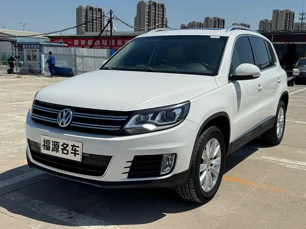 Volkswagen Tiguan 2014 — фото 1