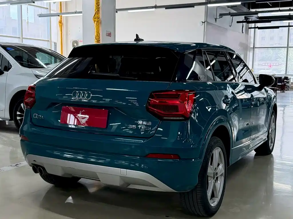 Audi Q2L 2019 — фото 9