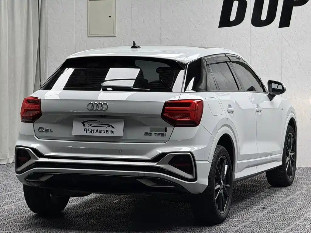 Audi Q2L 2022 — фото 12