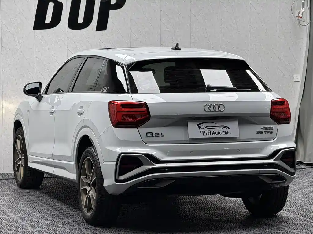 Audi Q2L 2022 — фото 10