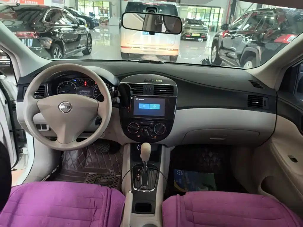 Nissan Tiida 2016 — фото 10