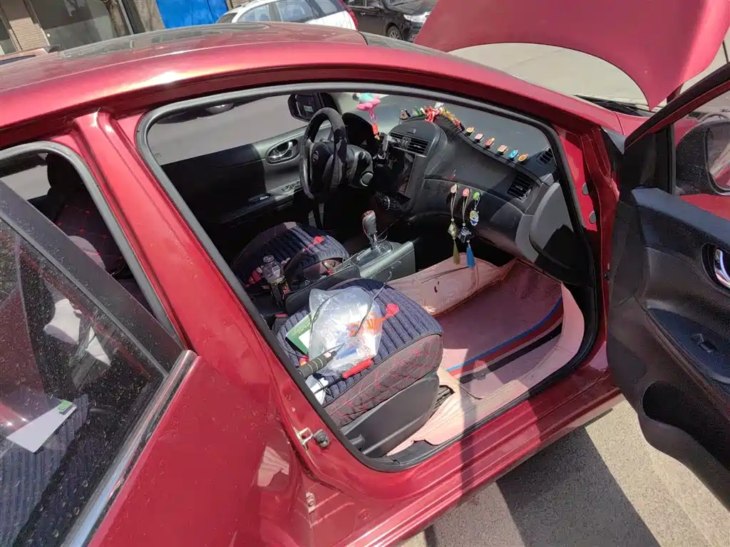 Nissan Tiida 2015 — фото 20