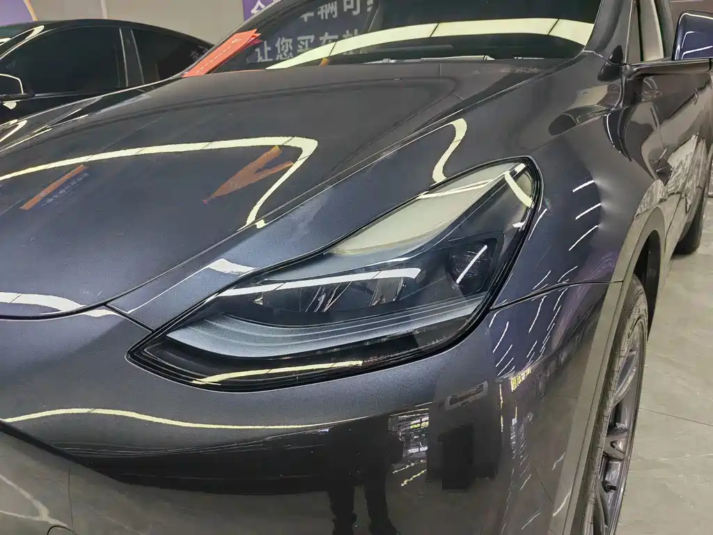 Tesla Model Y 2024 — фото 11