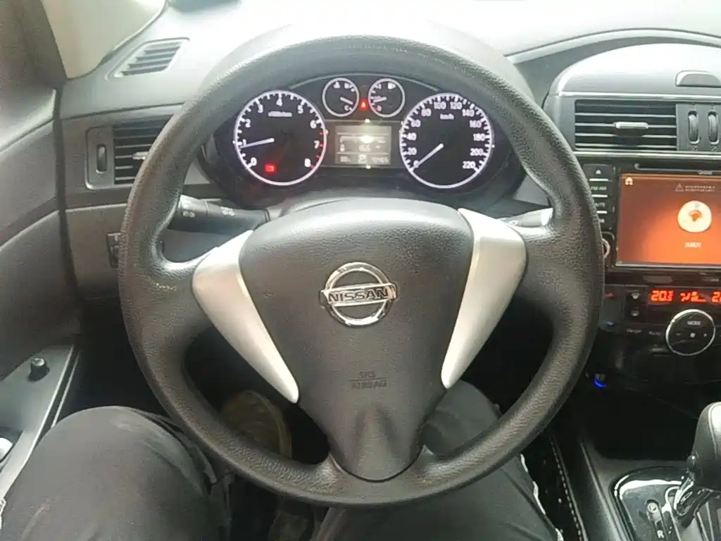 Nissan Tiida 2014 — фото 11