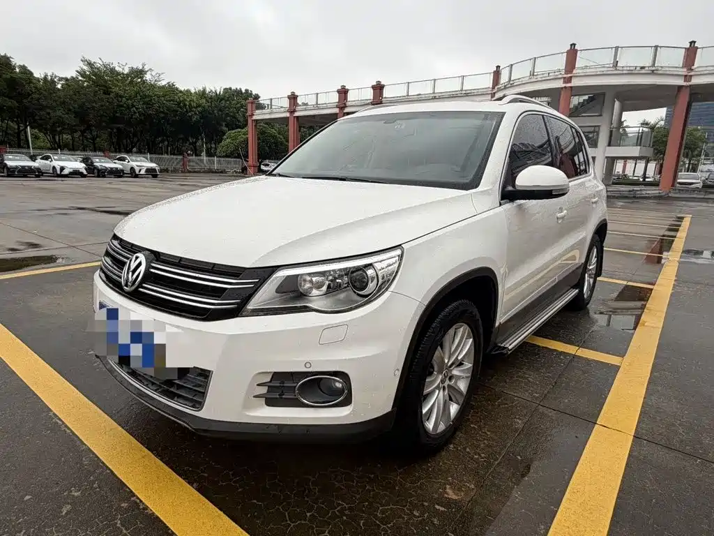 Volkswagen Tiguan 2013 — фото 1