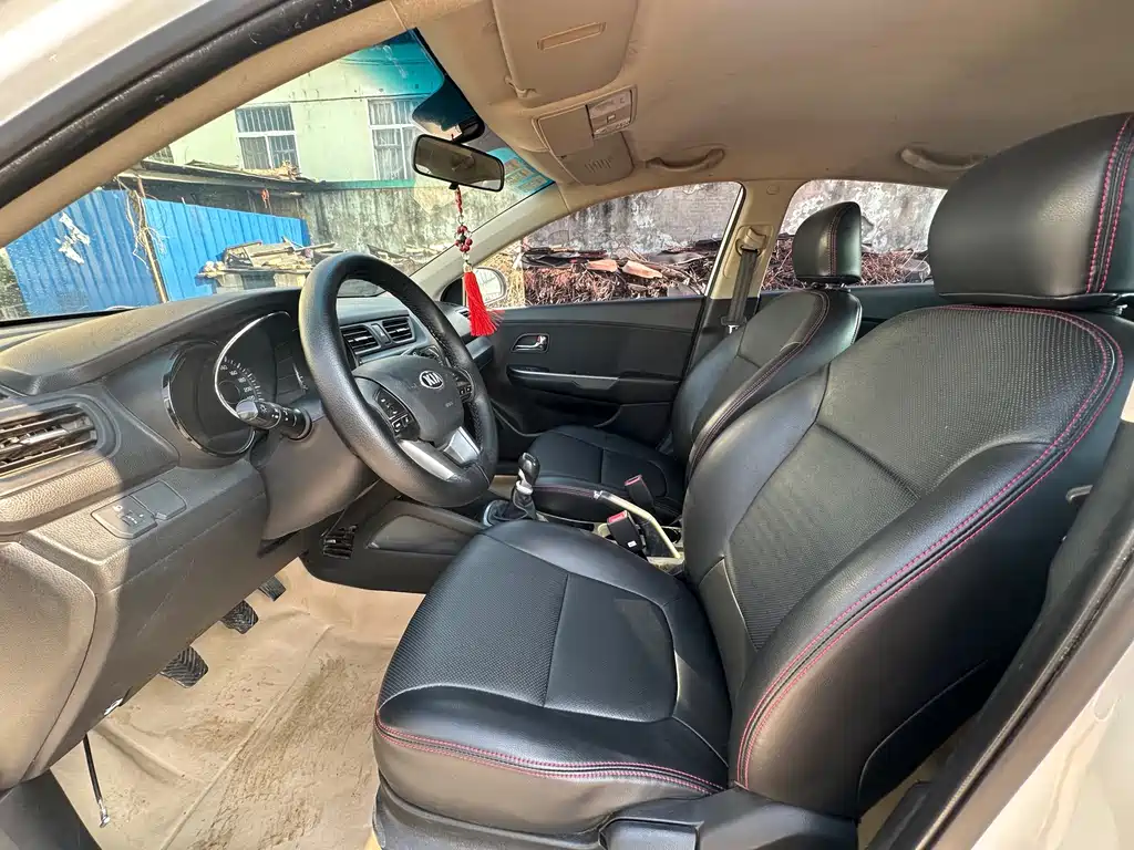 Kia K2 2013 — фото 7