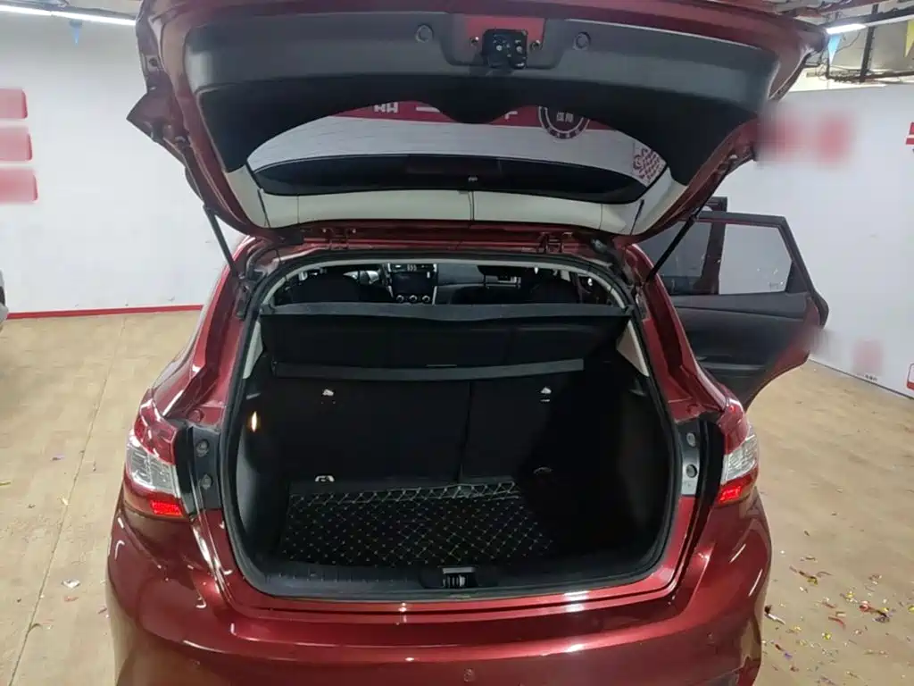 Nissan Tiida 2018 — фото 19
