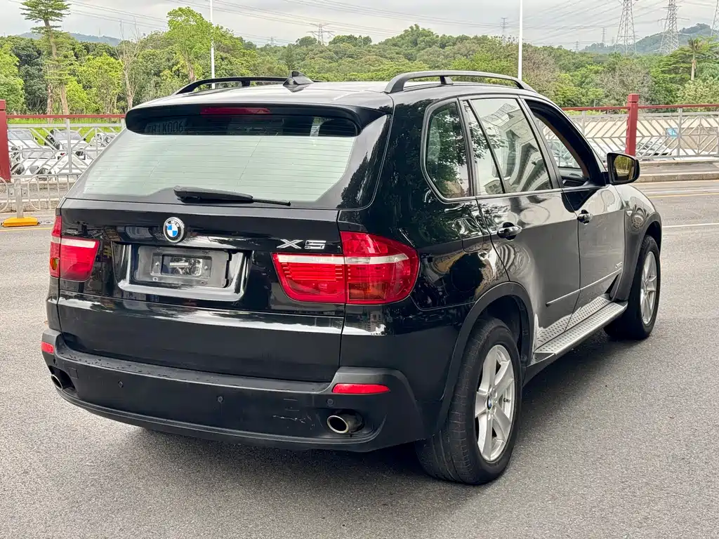 BMW X5 2010 — фото 4