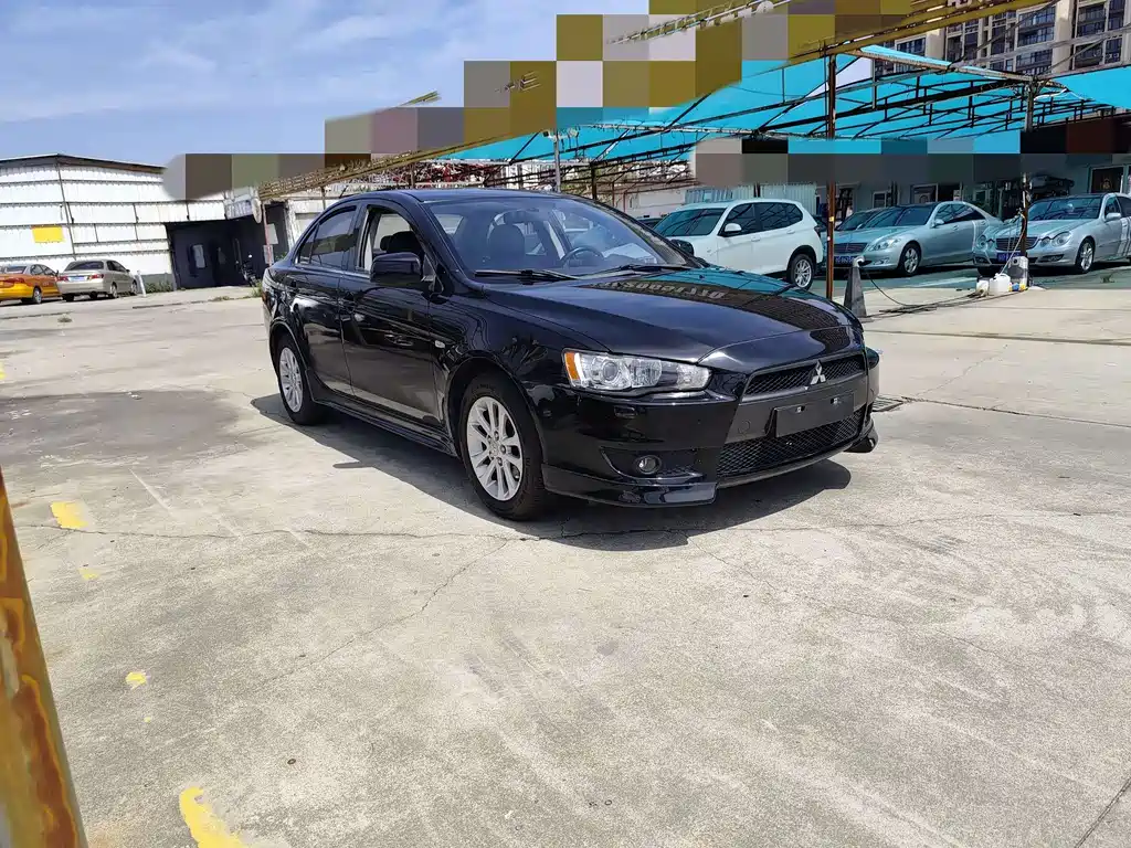 Mitsubishi Lancer EX 2013 — фото 2