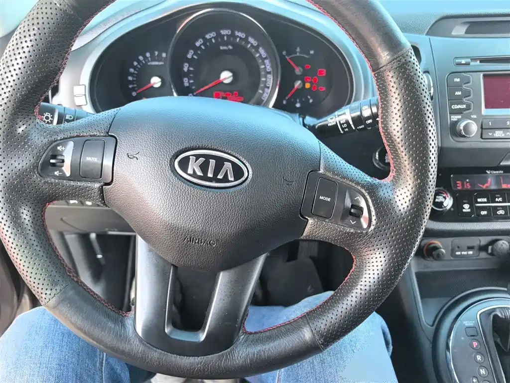 Kia Sportage 2014 — фото 11