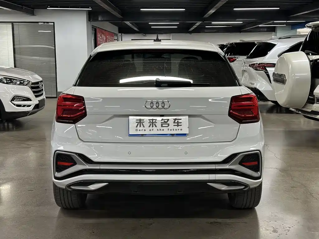 Audi Q2L 2022 — фото 9