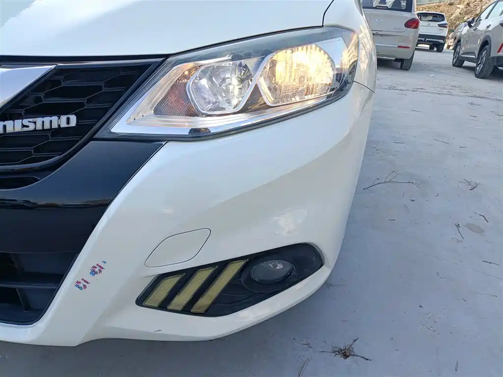 Nissan Tiida 2017 — фото 18