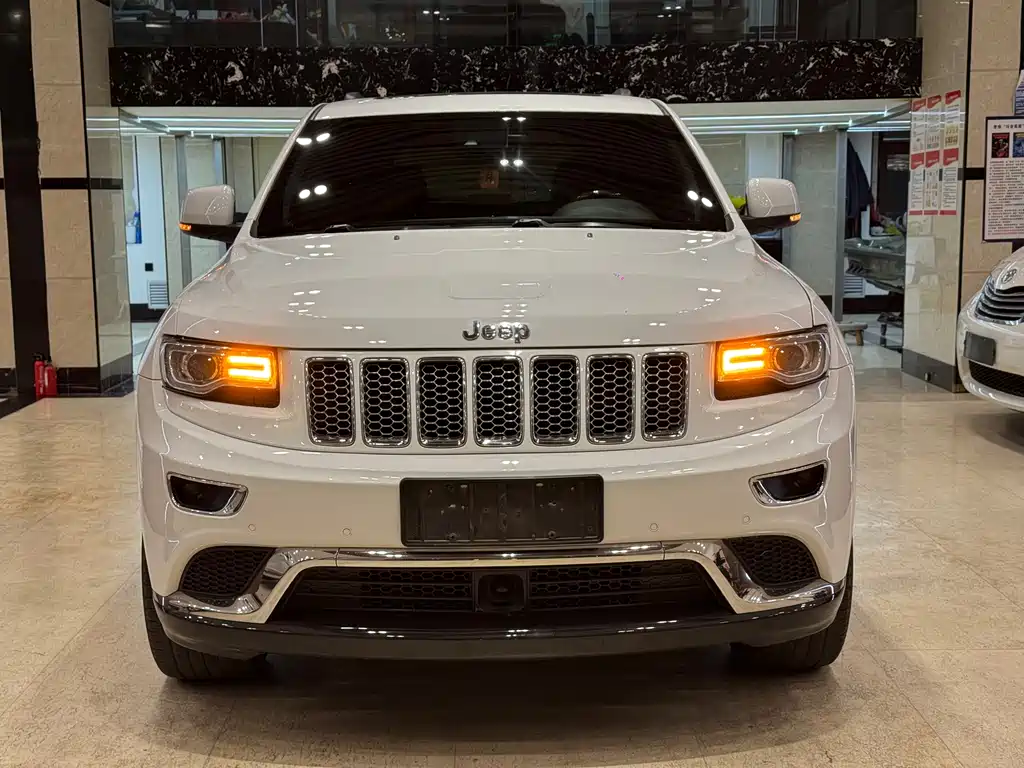 Jeep Grand Cherokee 2014 — фото 2