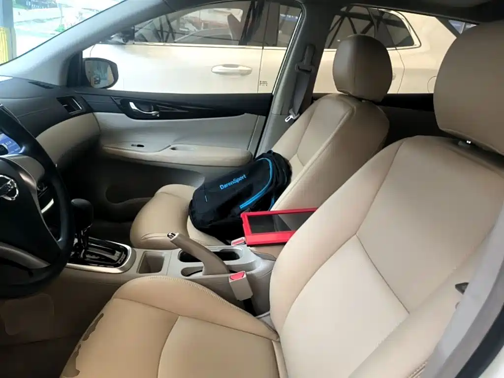 Nissan Tiida 2016 — фото 15