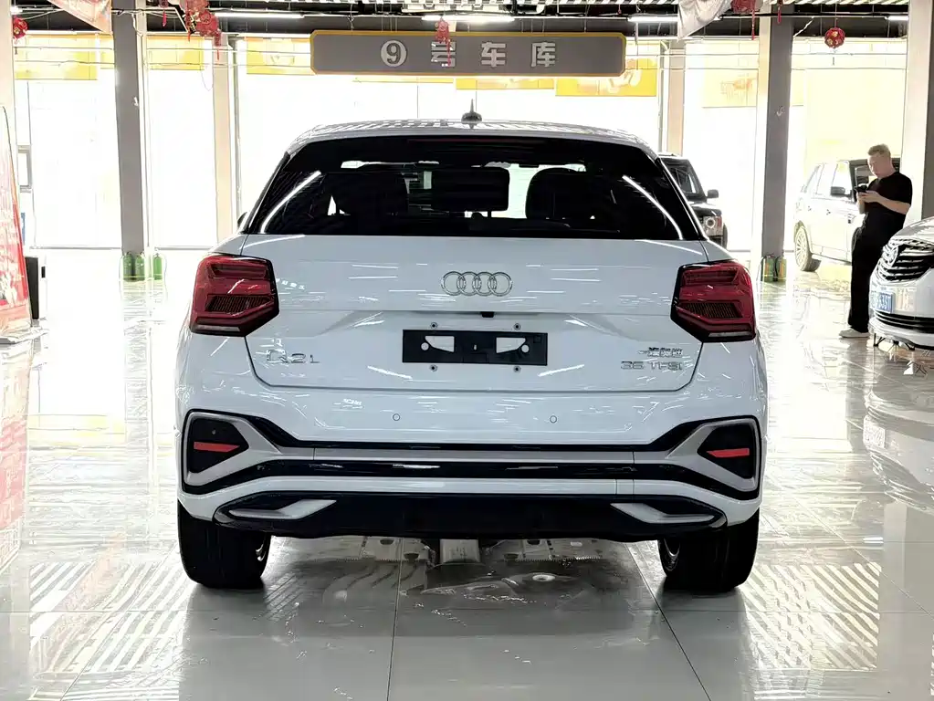 Audi Q2L 2023 — фото 9