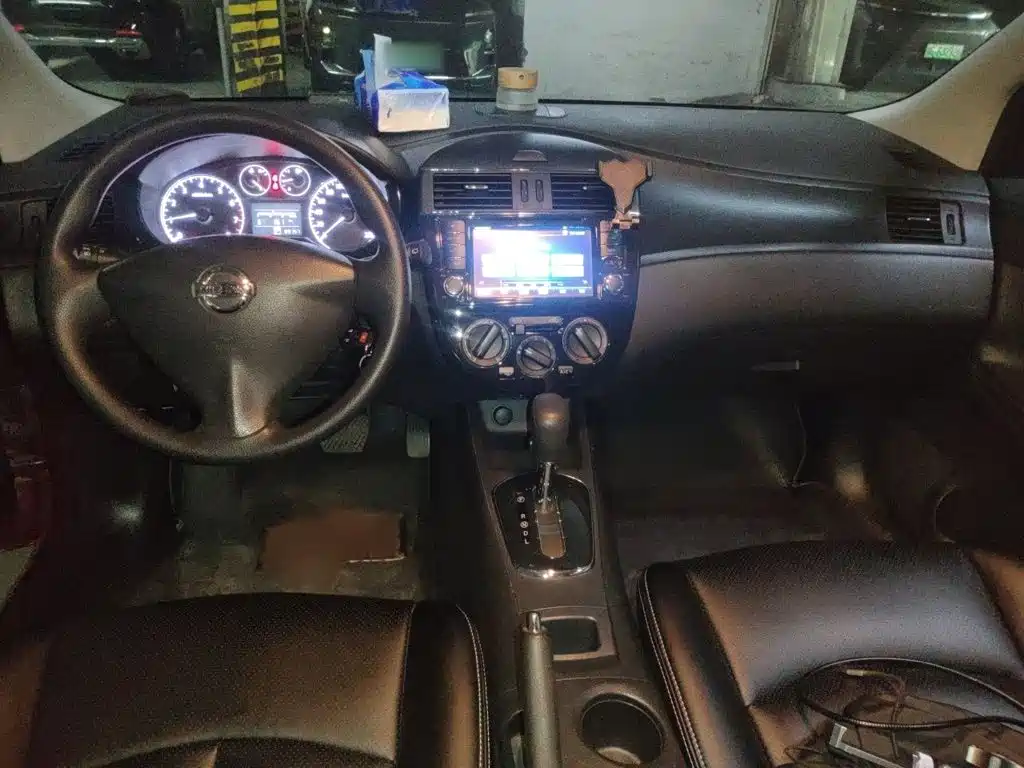Nissan Tiida 2015 — фото 13