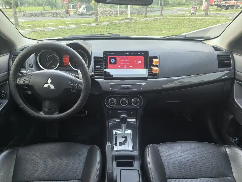 Mitsubishi Lancer EX 2012 — фото 11