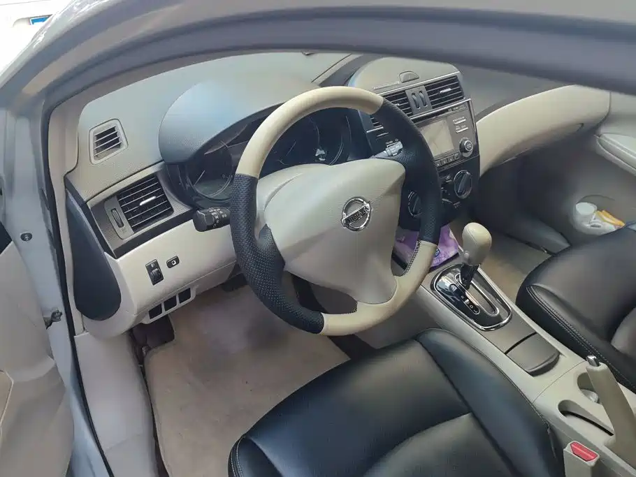 Nissan Tiida 2015 — фото 15