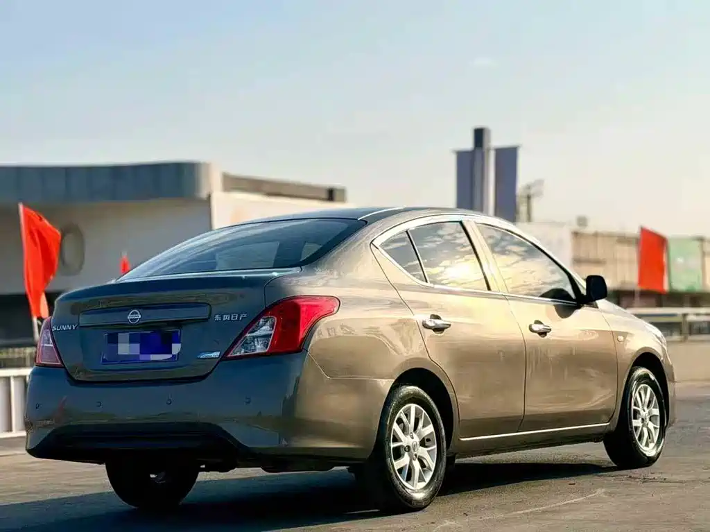 Nissan Sunny 2014 — фото 4