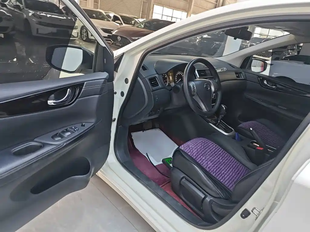 Nissan Tiida 2019 — фото 16