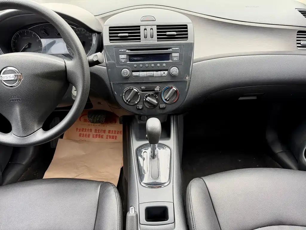 Nissan Tiida 2015 — фото 14