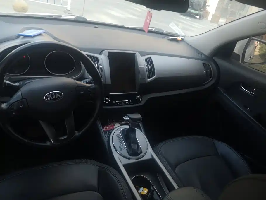 Kia Sportage 2014 — фото 12