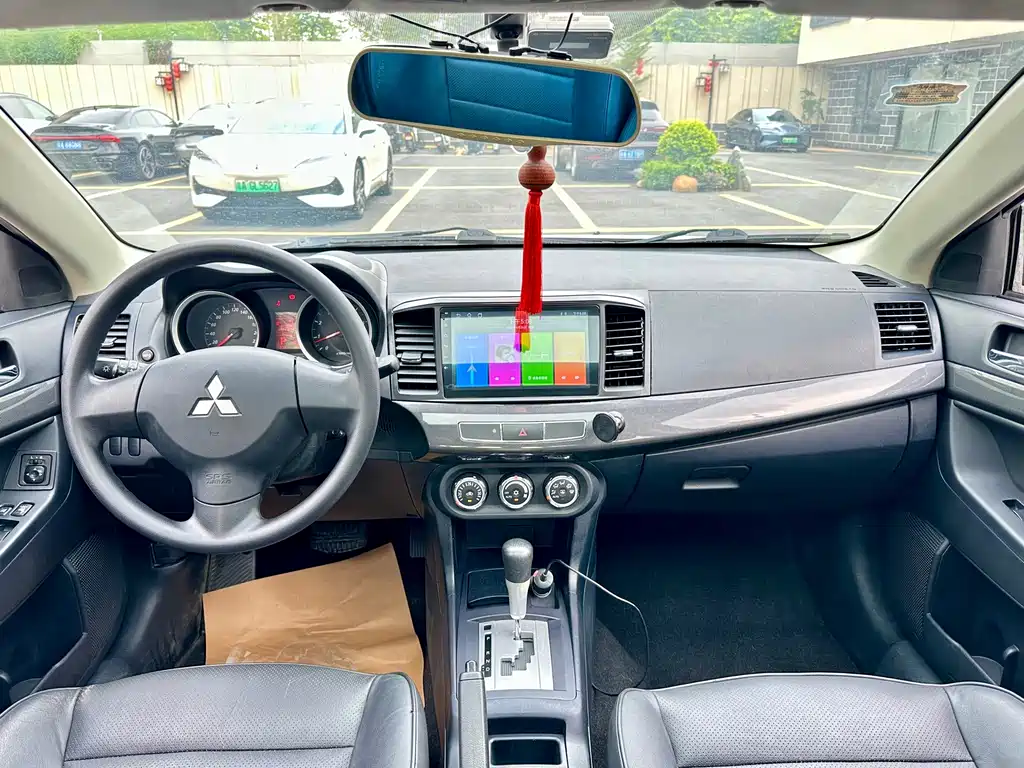 Mitsubishi Lancer EX 2015 — фото 12