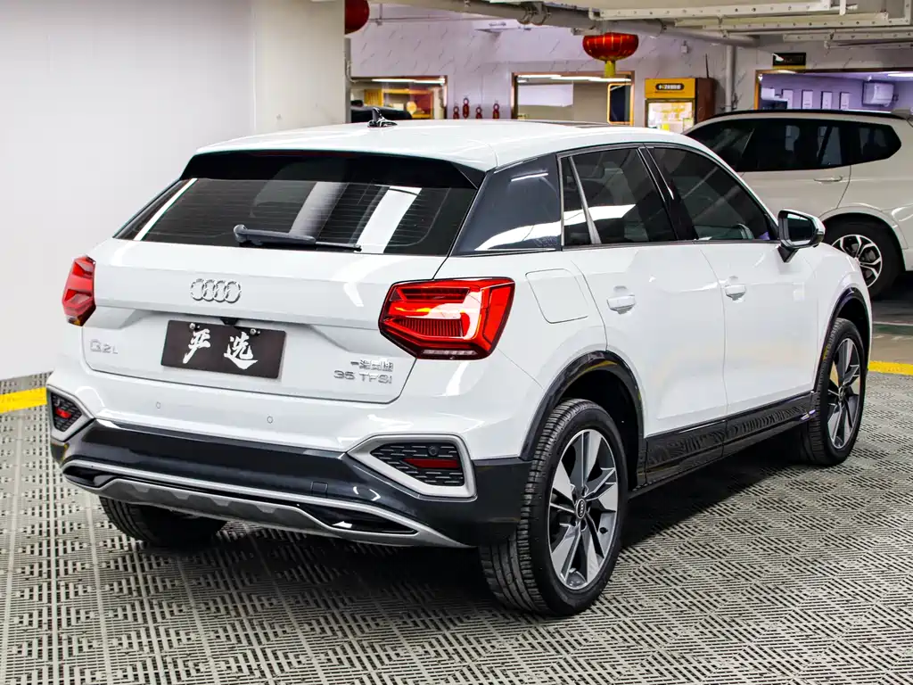 Audi Q2L 2022 — фото 23