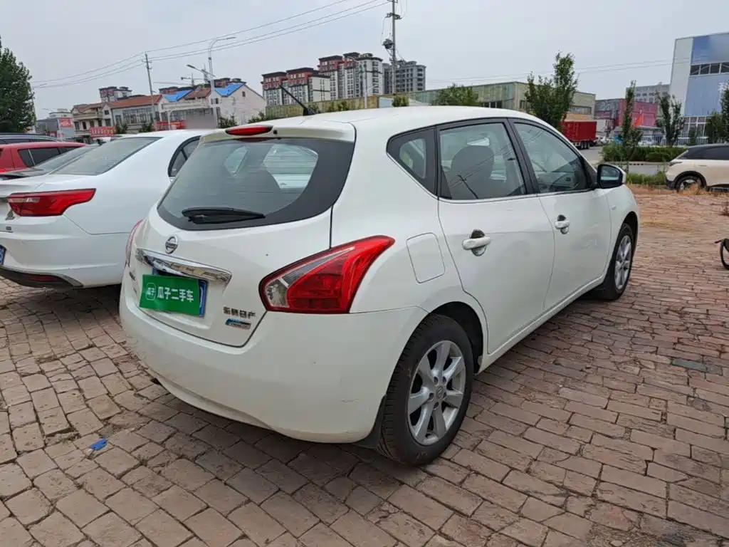 Nissan Tiida 2015 — фото 7