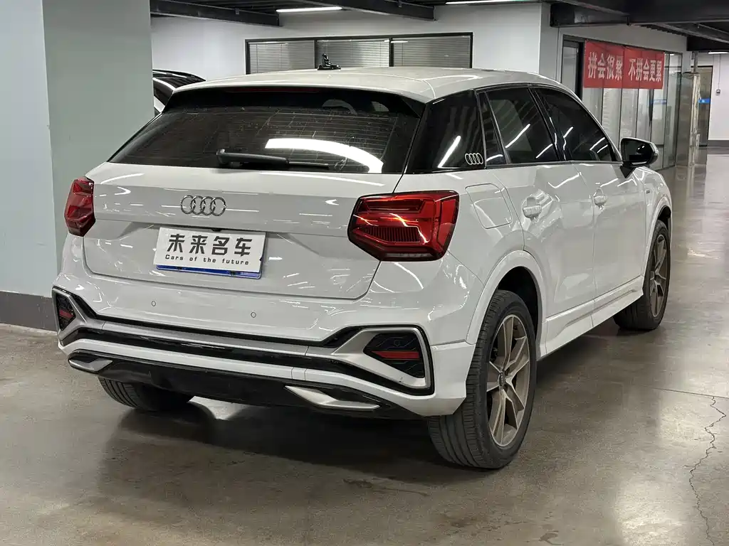 Audi Q2L 2022 — фото 11