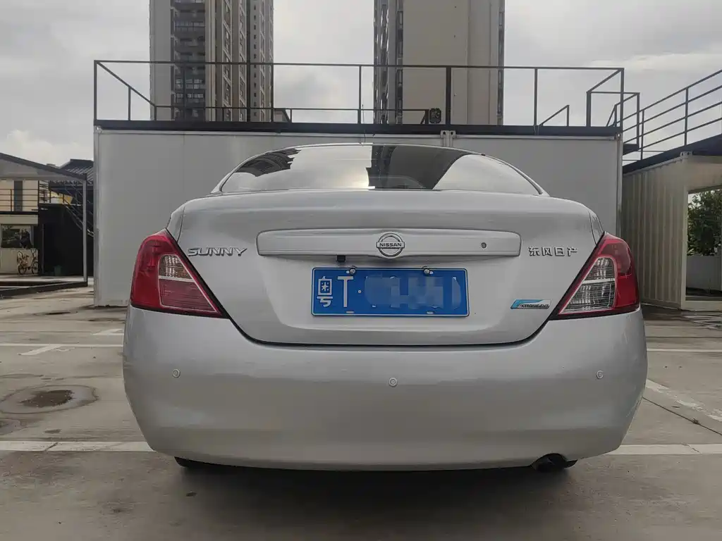 Nissan Sunny 2012 — фото 11