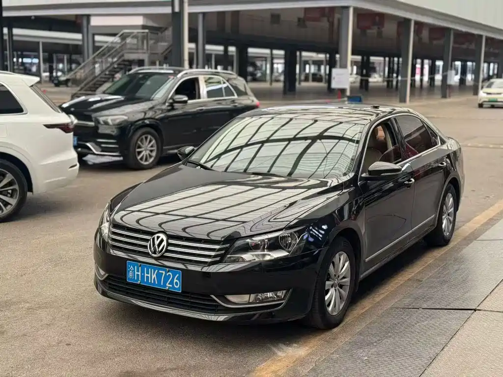 Volkswagen Passat 2014 — фото 1